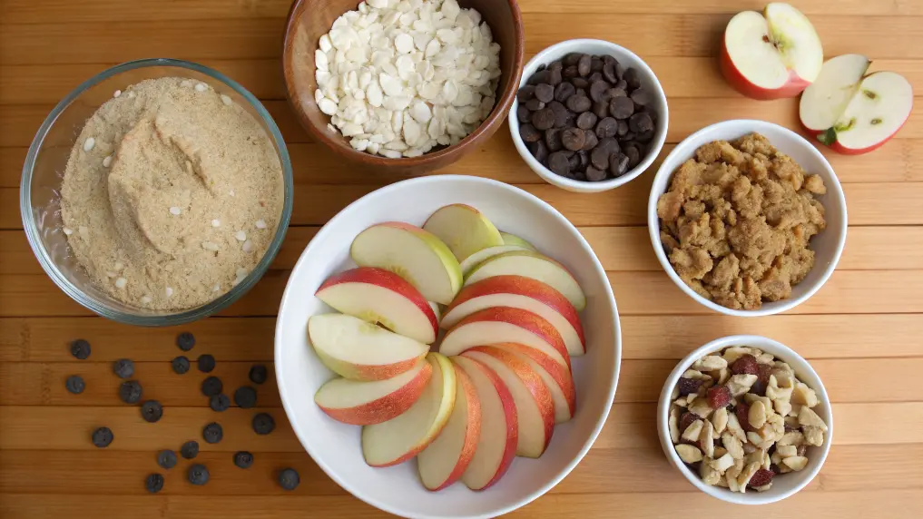 Ingredients for candy apple cookies displayed on a kitchen counter.
